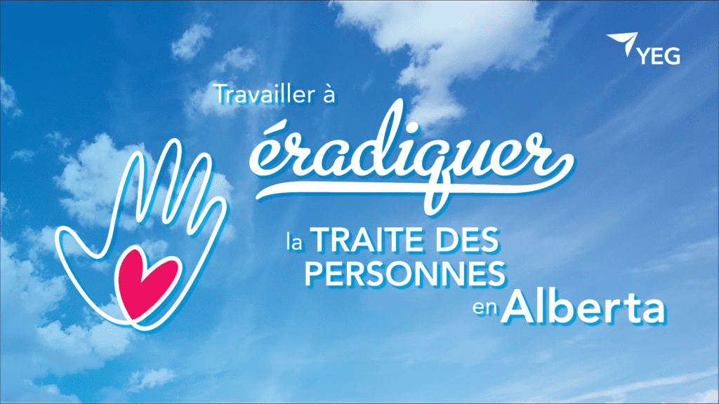 A graphic with a blue sky background and words that read Working towards an Alberta free of Human Trafficking. An outline of a hand with a heart in the center is on the left side of the graphic.